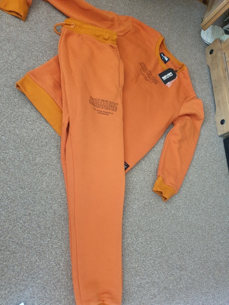 burnt orange tracksuit